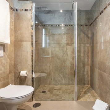 Walk-in shower bathroom remodel with modern finishes in Los Angeles by Trusted Contractor LA